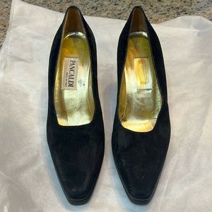Black suede heels with a little platform. Size 8. Used.